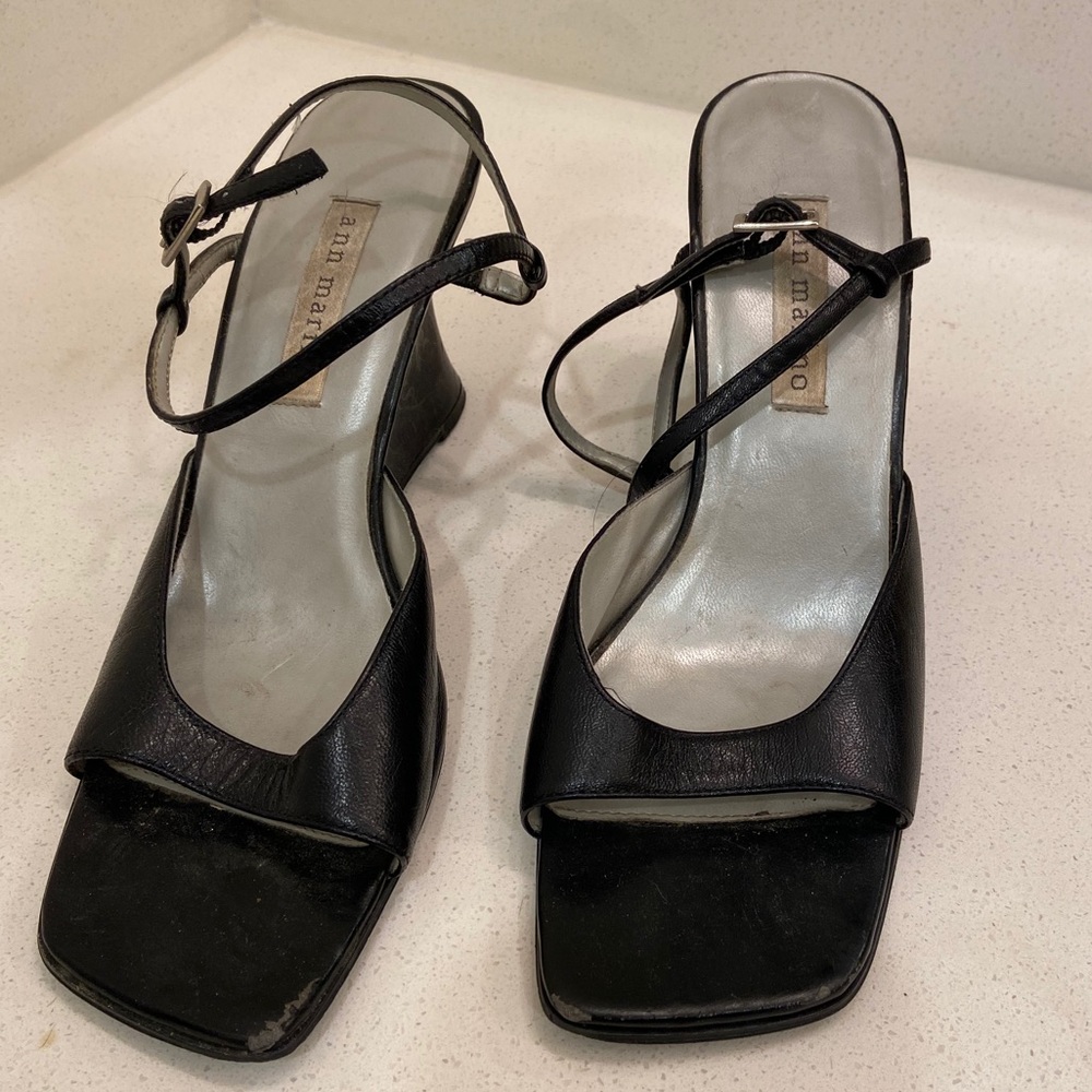 Black wedges with ankle strap.